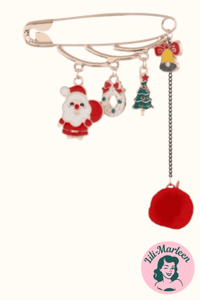 Brochenål med vedhæng, julemand, krans, træ og klokke