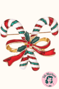 Broche - slikstokke med rødt bånd