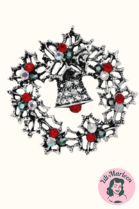 Broche - sølv cirkel med et væld af glitrende sten, rød/grøn/hvid