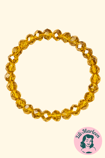 Emely – Elastisk Armbånd med Gyldne Facetperler