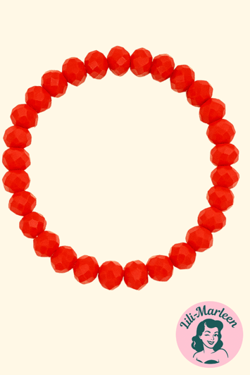 Emely – Elastisk Armbånd med Orangerøde Facetperler