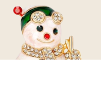 Julebroche - snemand på ski med glitrende sten