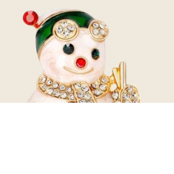 Julebroche - snemand på ski med glitrende sten