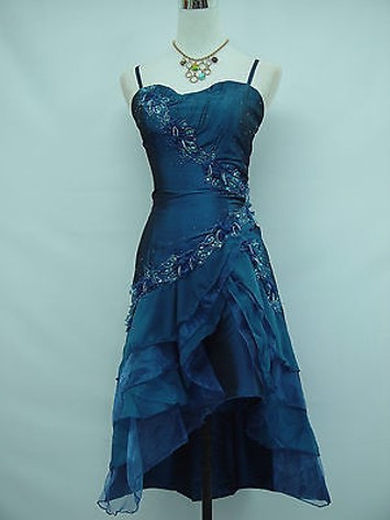 Kort festkjole - Janat - feminin kort festkjole i blå i flere længder