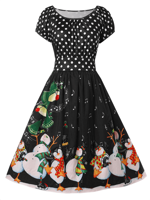 Julekjole: Christmas Dotty - sød sort kjole med polka prikker på overdelen