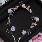 Blomsterkrans/krystalbånd med blomster i blå og sten, guld