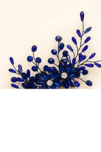 Hårkam: Smuk hårkam blå/navyblå facet sten på guld kam