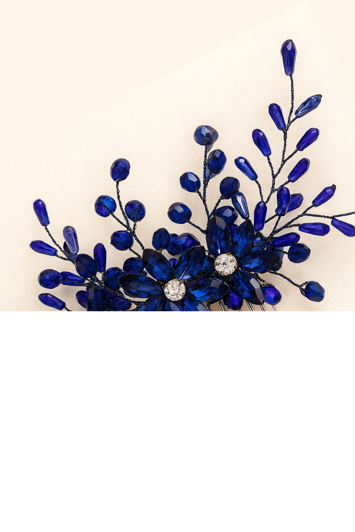 Hårkam: Smuk hårkam blå/navyblå facet sten på guld kam